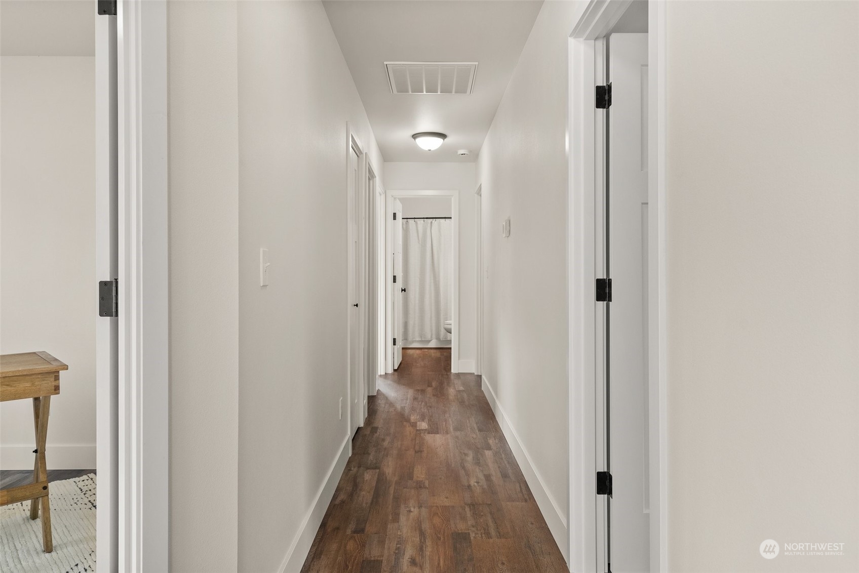379-14 Collins Road Toledo, WA 98591 - Photo 12 of 30 a view of a hallway with wooden floor