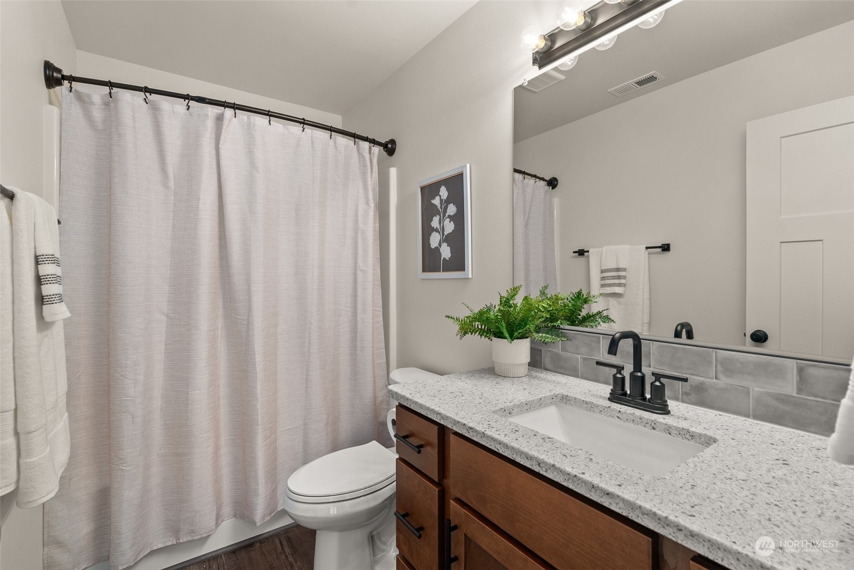 379-14 Collins Road Toledo, WA 98591 - Photo 18 of 30 a bathroom with a granite countertop sink and a mirror