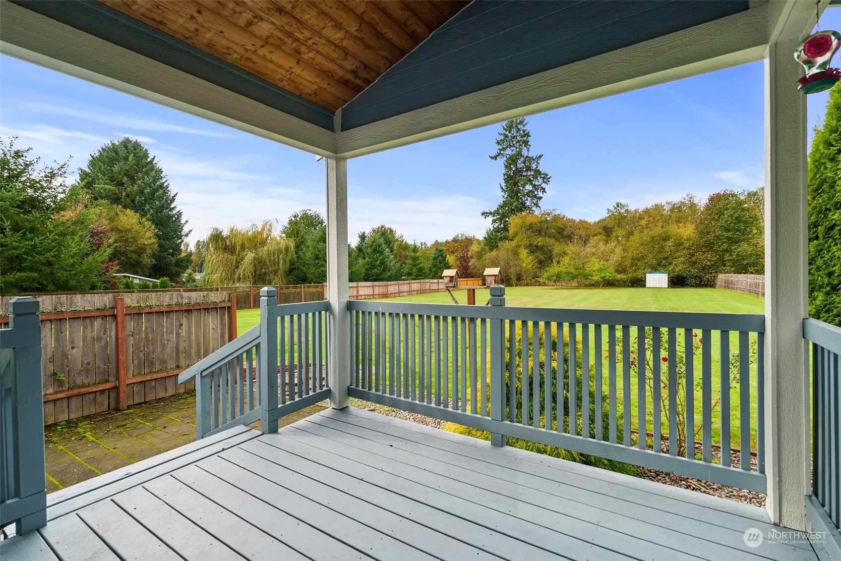 379-14 Collins Road Toledo, WA 98591 - Photo 23 of 30 a view of balcony with wooden floor and fence