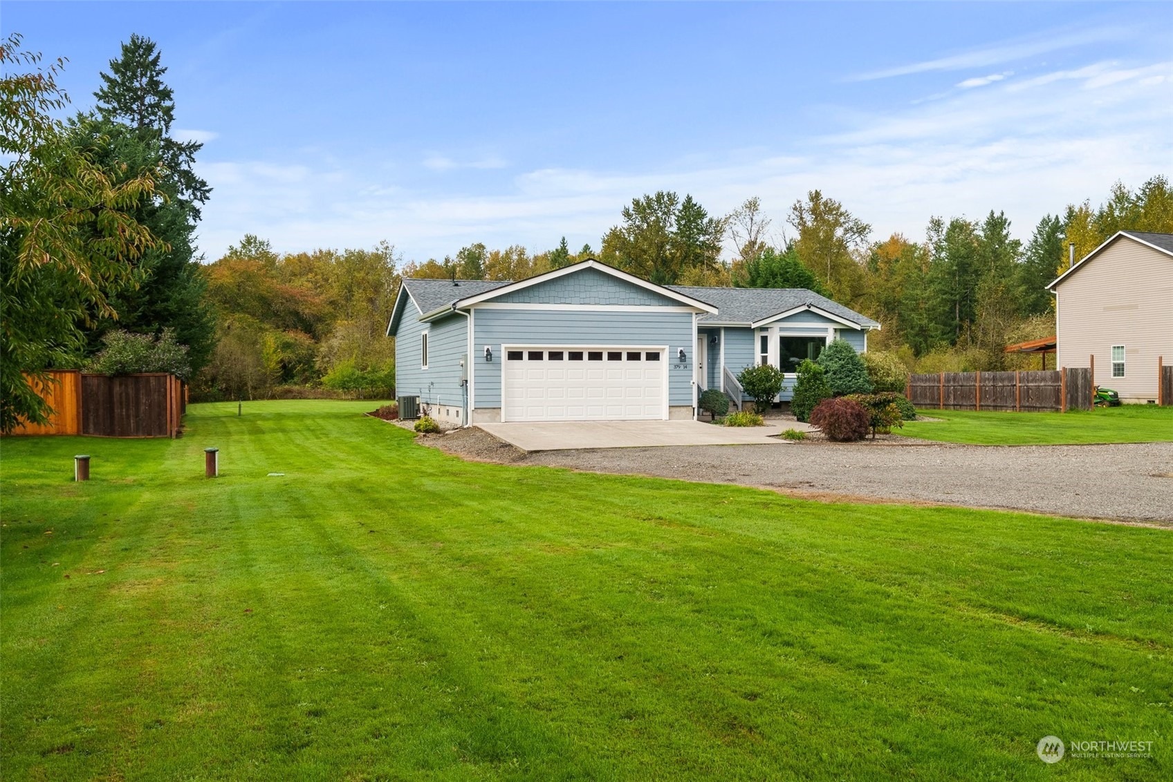 379-14 Collins Road Toledo, WA 98591 - Photo 30 of 30 a front view of a house with a yard and trees
