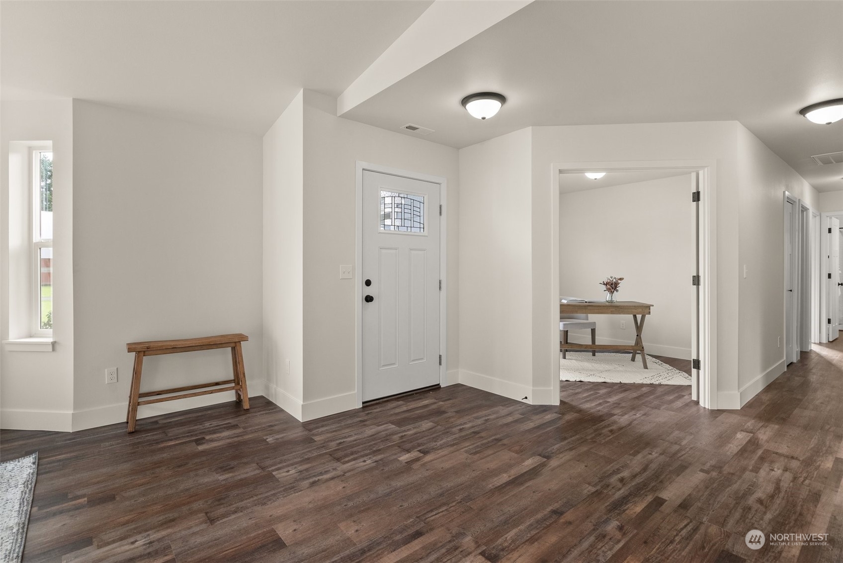 379-14 Collins Road Toledo, WA 98591 - Photo 4 of 30 a view of empty room with wooden floor and bathroom