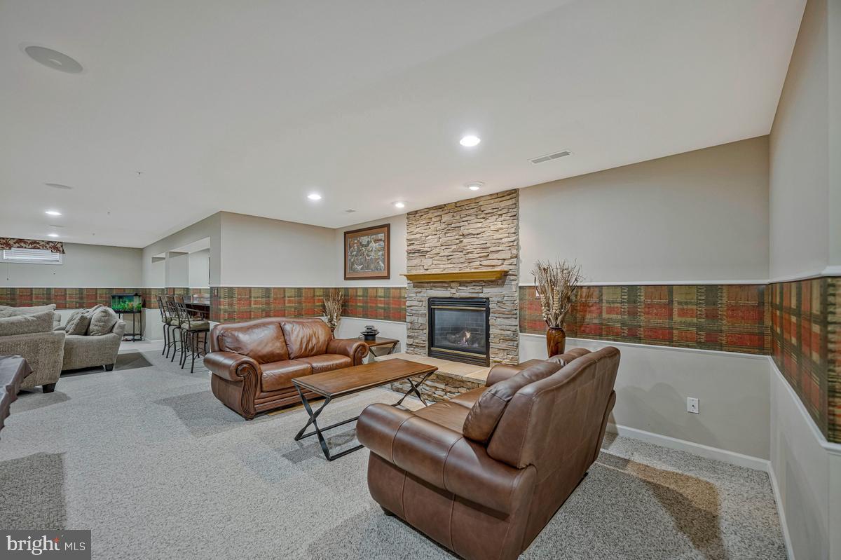 1117 Horizon View Place Accokeek, MD 20607 - Photo 51 of 59 Cozy basement retreat with fireplace.