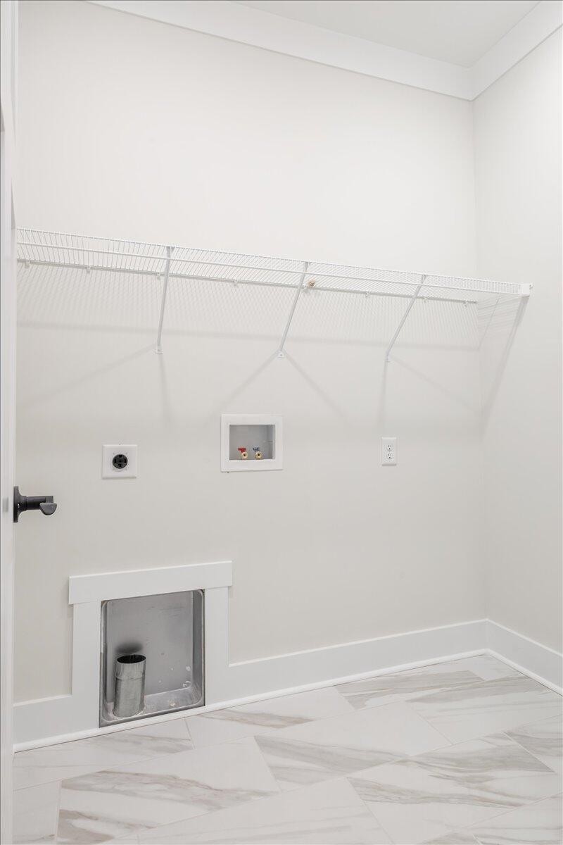 7391 Gamble Road Georgetown, TN 37336 - Photo 14 of 27 a view of a room with racks on the wall