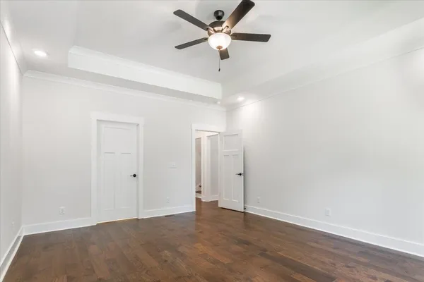 a bathroom with a granite countertop sink double and mirror