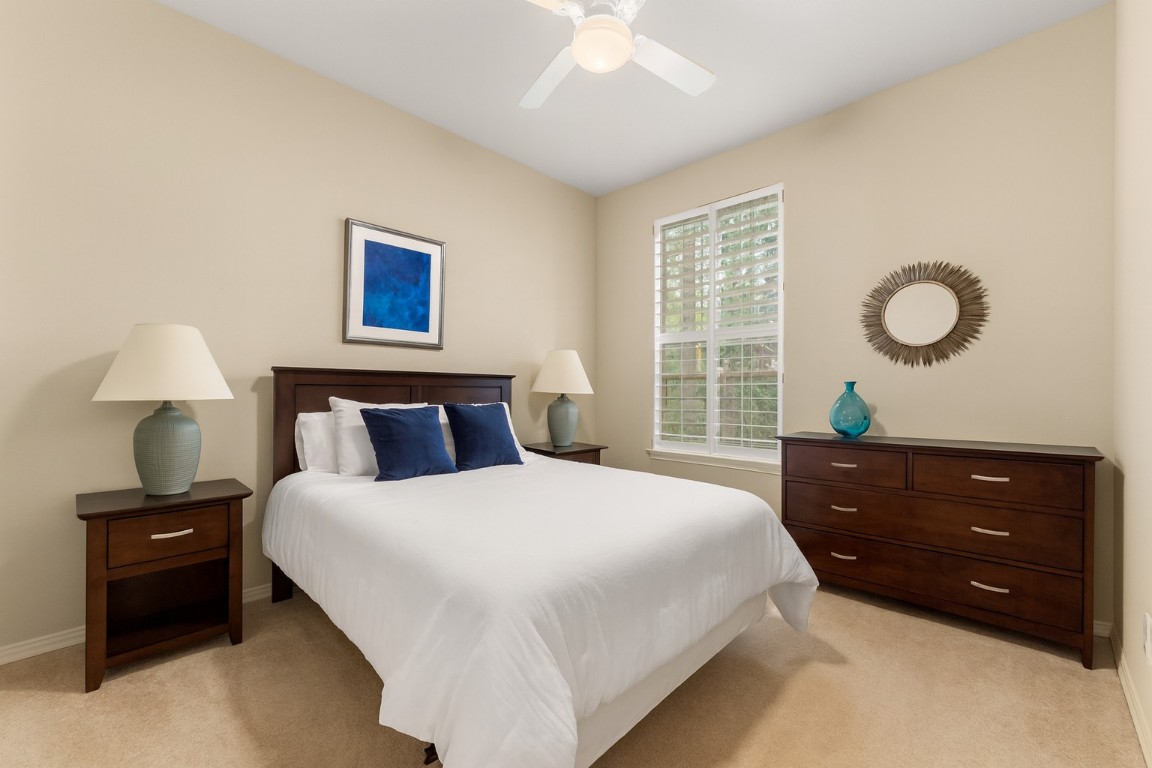 603 Flamingo Boulevard Lakeway, TX 78734 - Photo 11 of 40 The other secondary bedroom is currently used as an office. This is a virtual rendering of it as a bedroom.