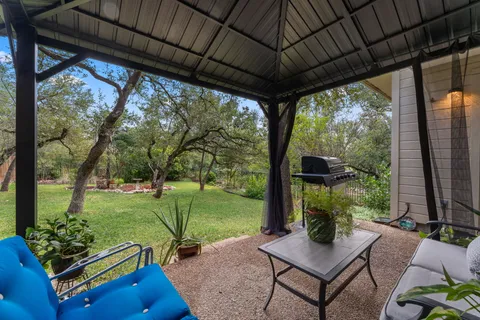 a view of a couches in backyard of the house