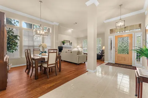 a living room with furniture and a rug