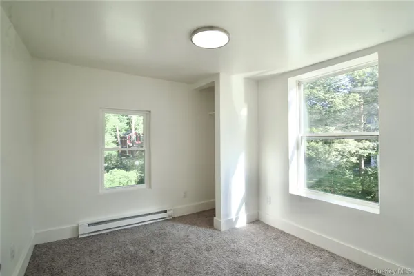 an empty room with windows