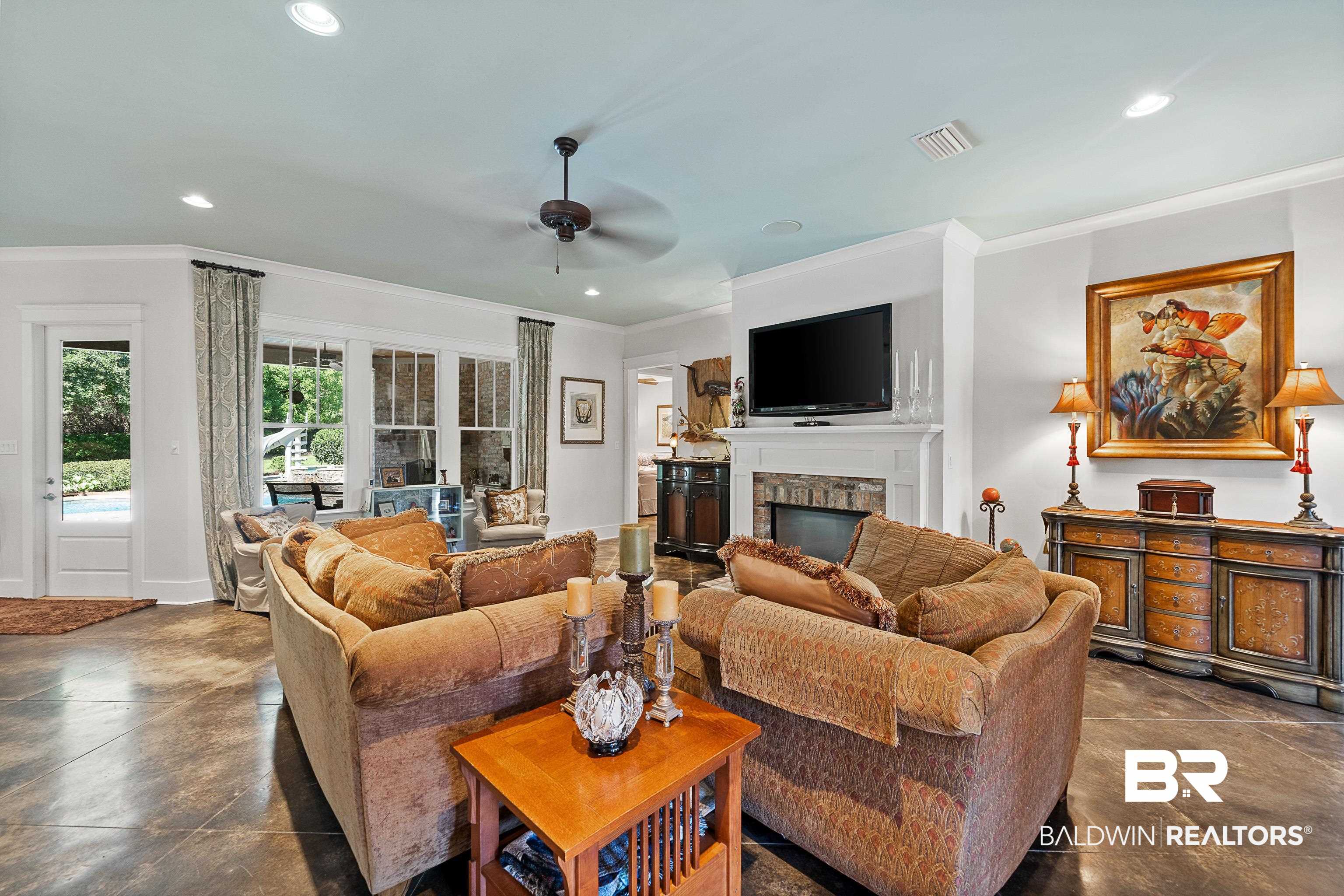 585 Falling Water Boulevard Fairhope, AL 36532 - Photo 12 of 67 Family Room Overlooking Pool