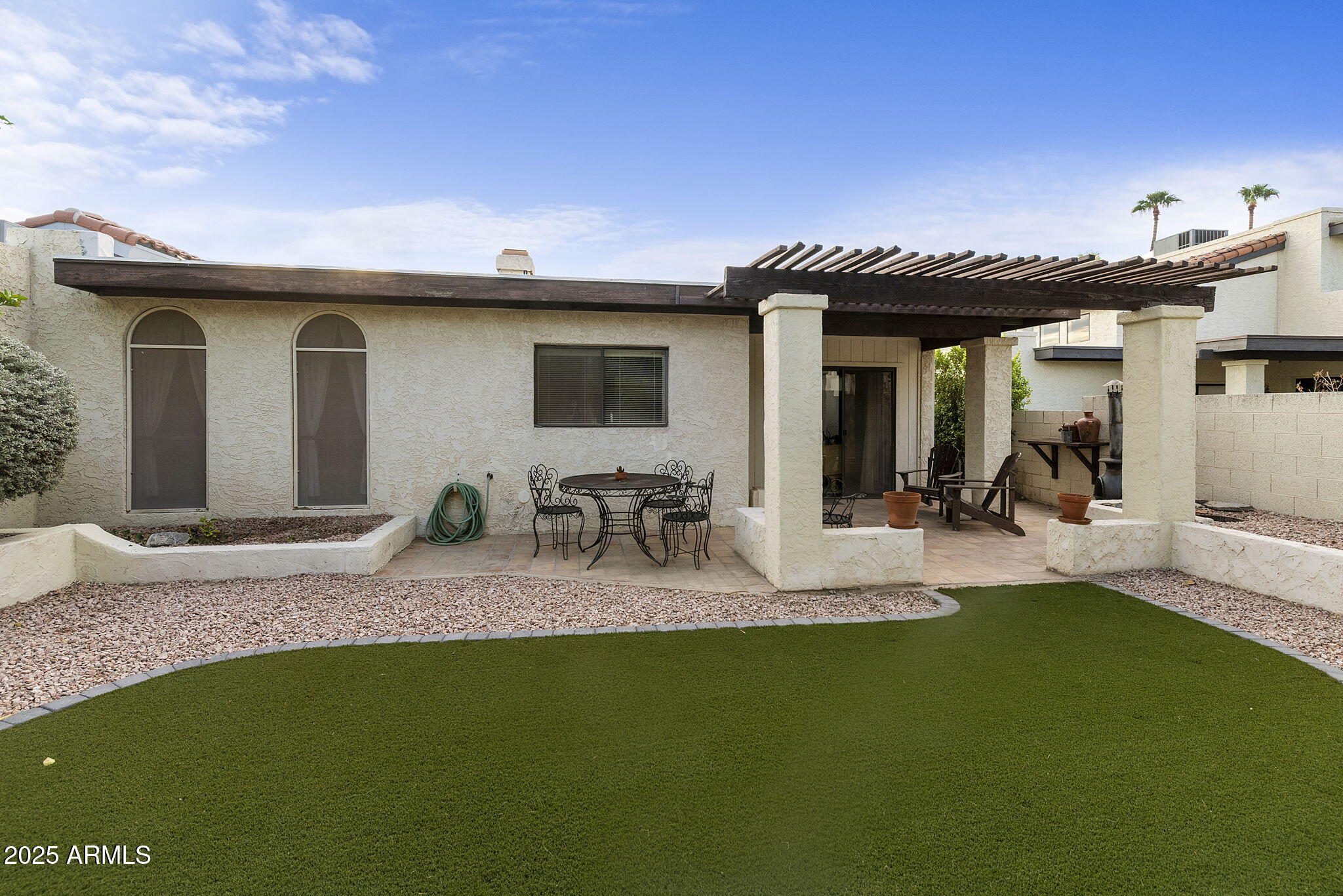 9406 South 47th Place Phoenix, AZ 85044 - Photo 14 of 31 Backyard to Patio