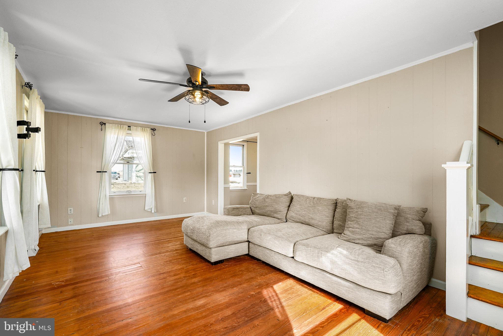 3050 Singerly Road Elkton, MD 21921 - Photo 15 of 24 a living room with furniture and a wooden floor
