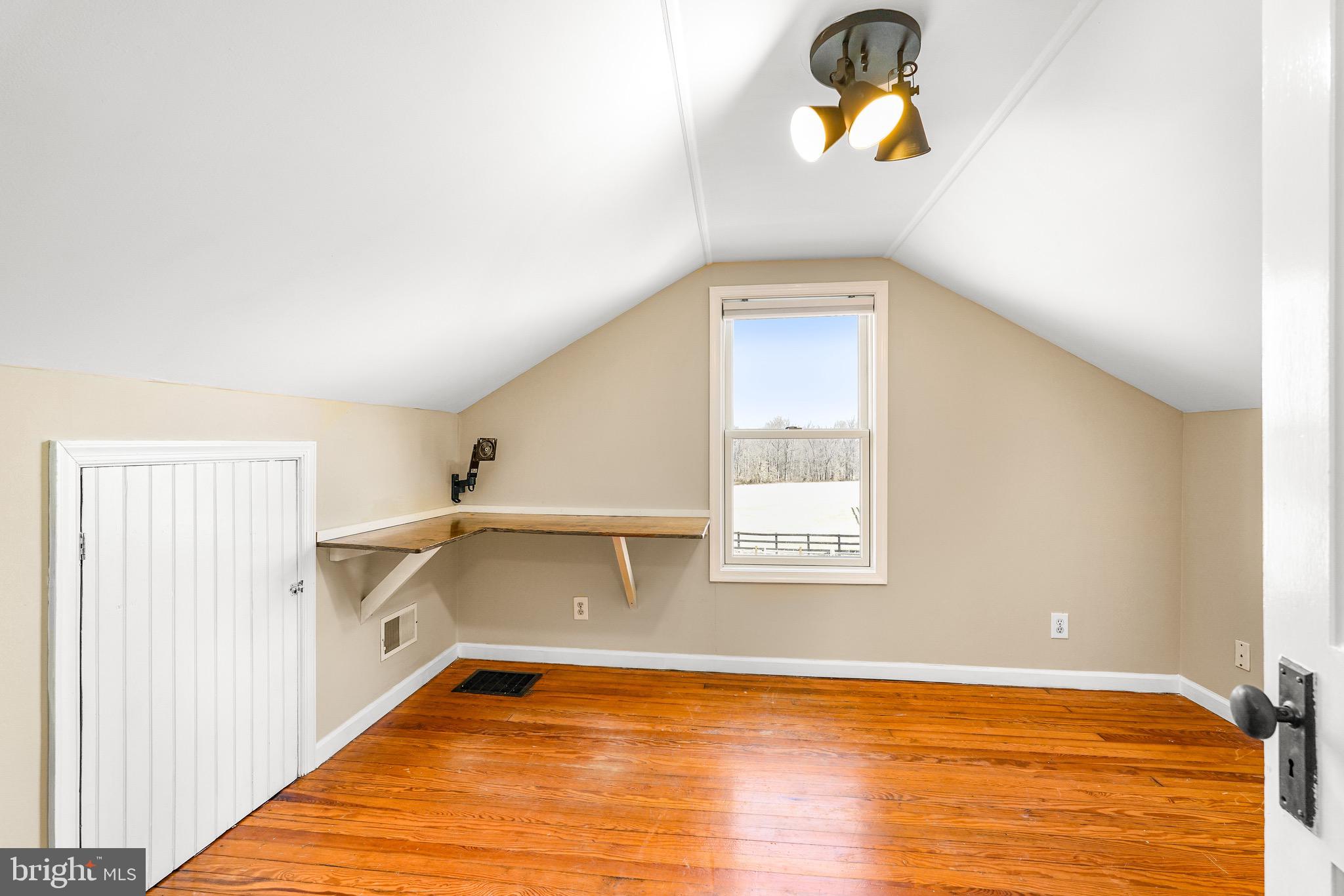 3050 Singerly Road Elkton, MD 21921 - Photo 17 of 24 a view of a kitchen with wooden floor and windows