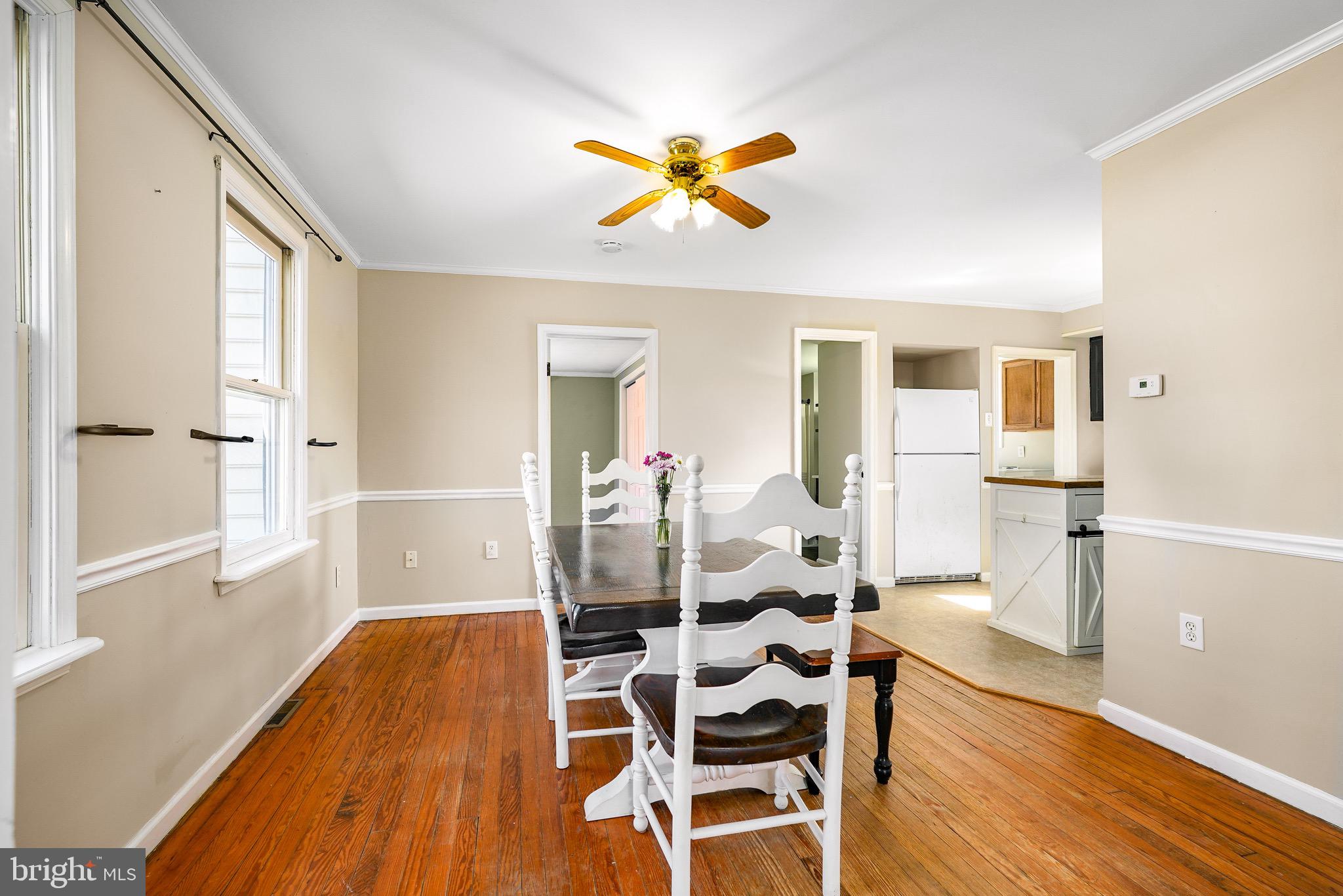 3050 Singerly Road Elkton, MD 21921 - Photo 8 of 24 a dining room with furniture and wooden floor