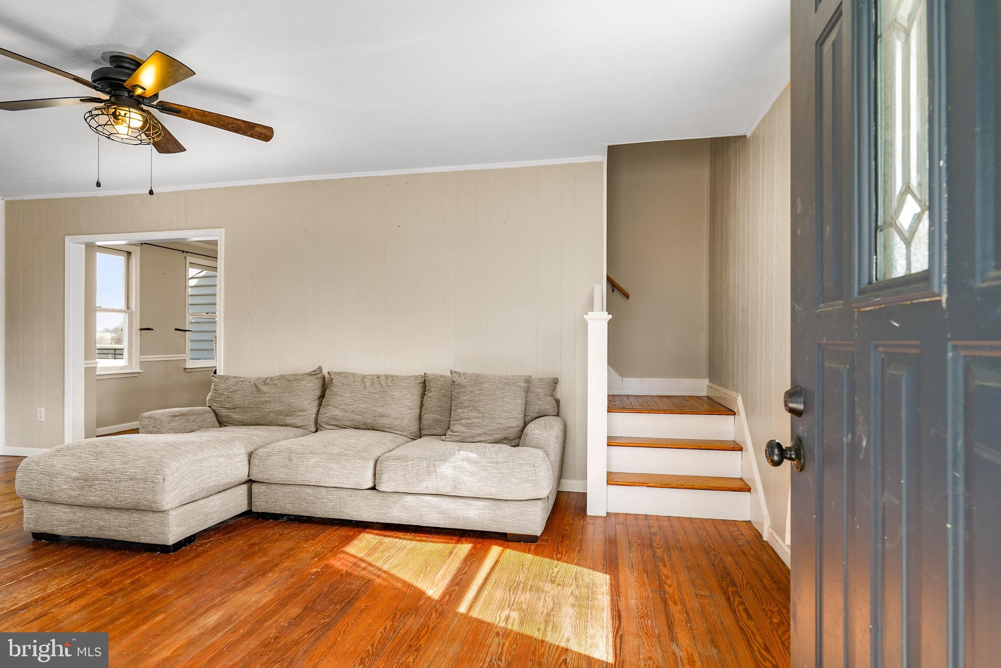 3050 Singerly Road Elkton, MD 21921 - Photo 10 of 24 a living room with furniture and a rug