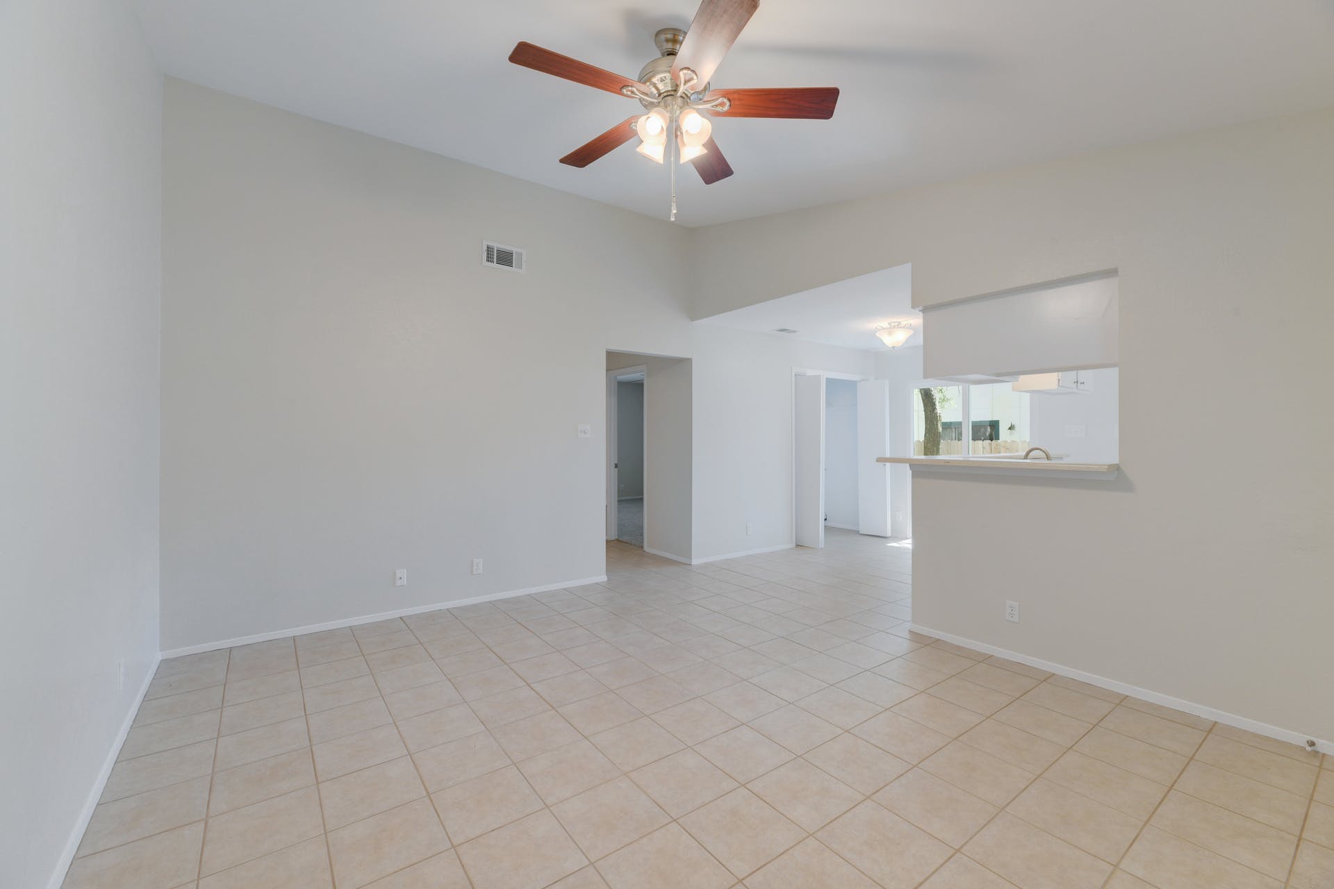 12603 Teague Trail, Unit B Austin, TX 78729 - Photo 3 of 14 a view of an empty room