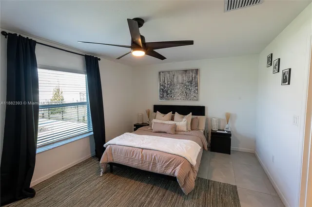 a bathroom with a double vanity sink and mirror