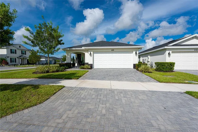 a view of a house with a swimming pool