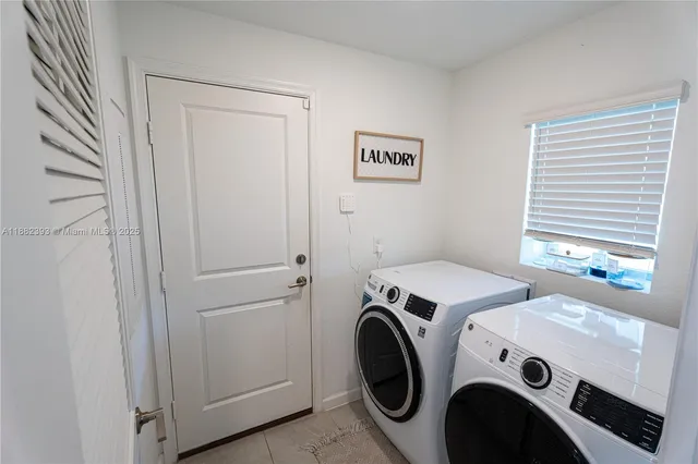 a kitchen with a sink stove and refrigerator
