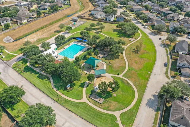 an aerial view of a swimming pool