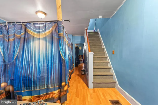 a view of swimming pool with seating area