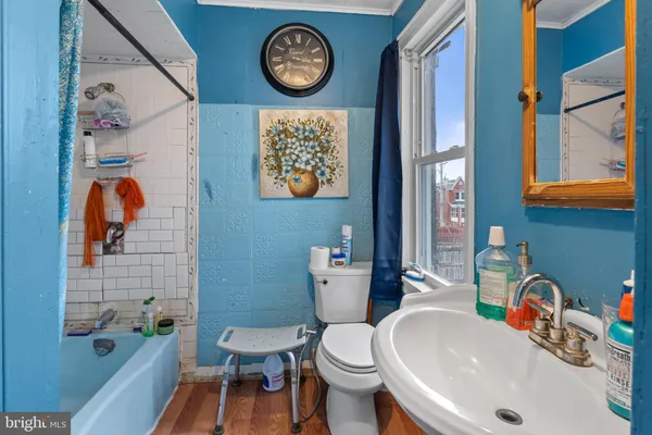 a bathroom with a sink and a toilet