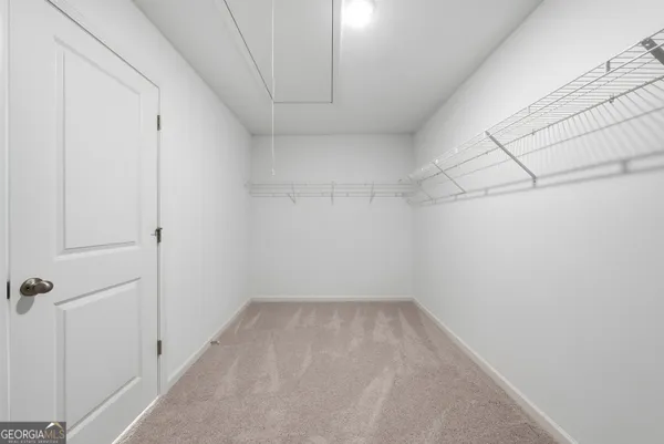 a view of a room with racks on the wall