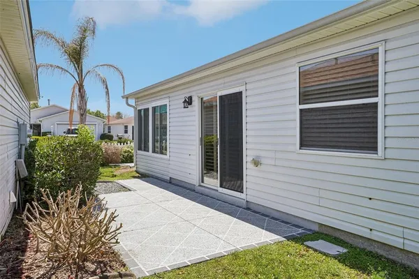 a view of a back yard of the house