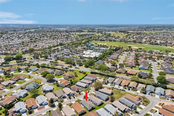 an aerial view of residential building and city
