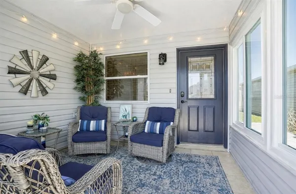 a living room with furniture and a window