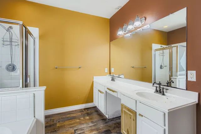 a bathroom with a sink and a mirror
