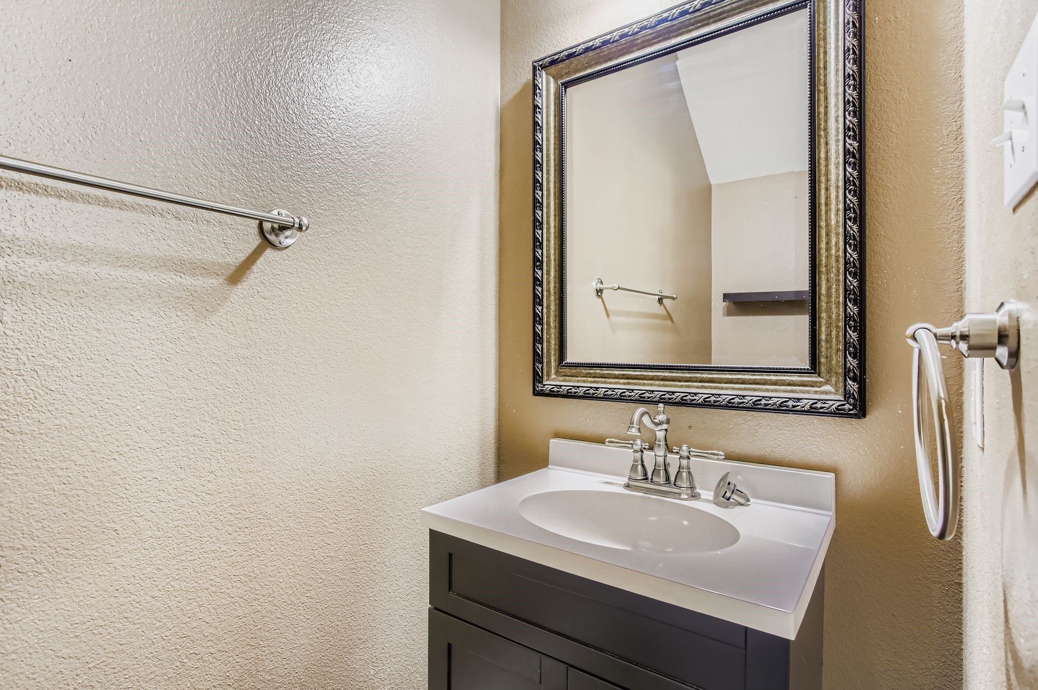 727 Pine Thicket Court Spring, TX 77373 - Photo 19 of 29 a bathroom with a sink and a mirror