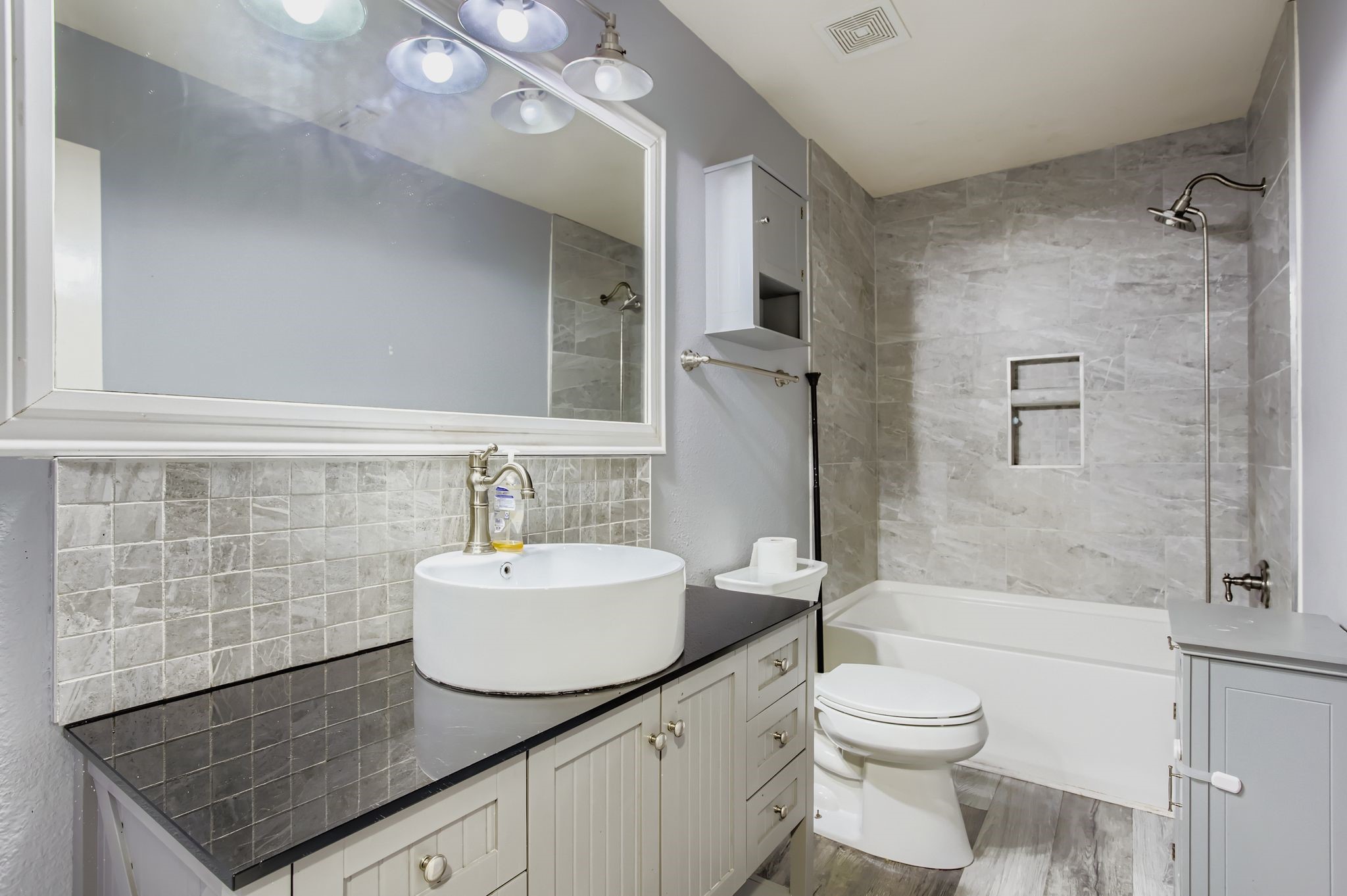 727 Pine Thicket Court Spring, TX 77373 - Photo 24 of 29 a bathroom with a sink a toilet and shower