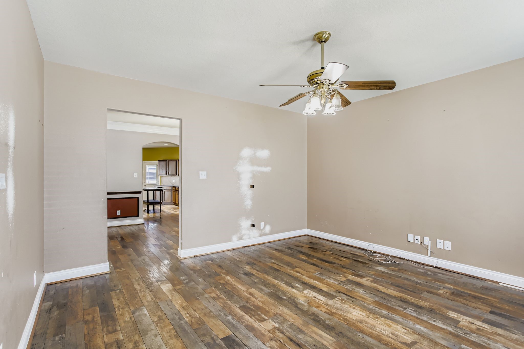 727 Pine Thicket Court Spring, TX 77373 - Photo 7 of 29 wooden floor in an empty room with a window