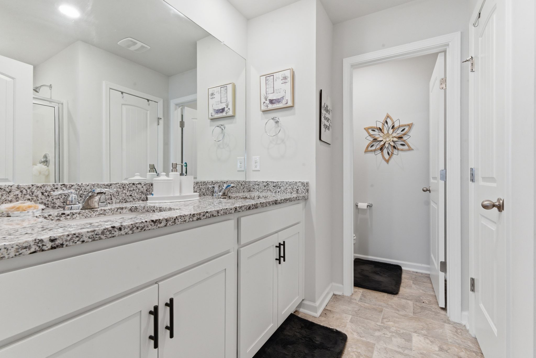 314 Carr Lane Lebanon, TN 37087 - Photo 8 of 14 a bathroom with a granite countertop sink and a mirror