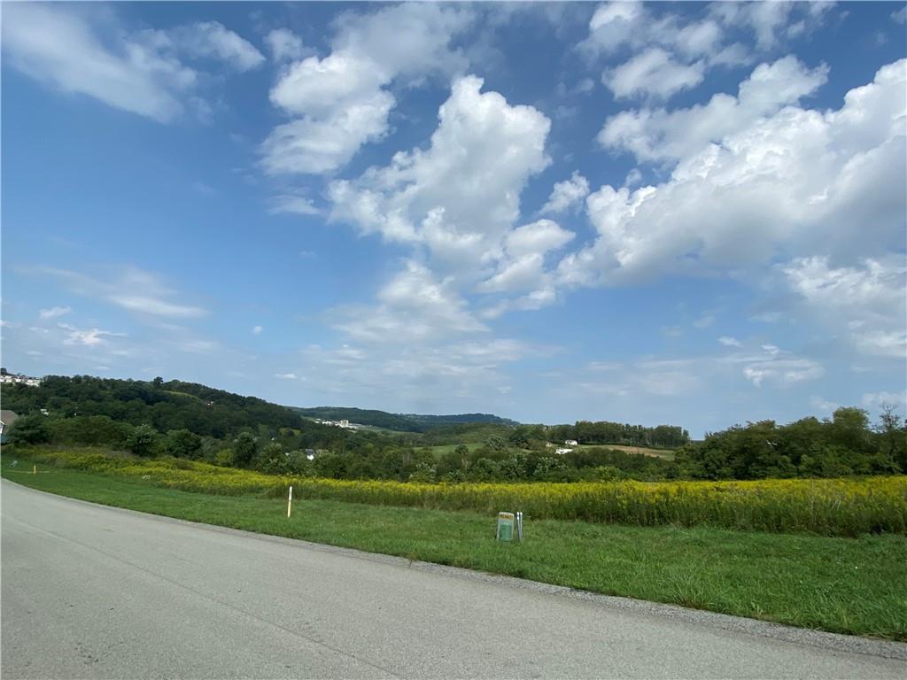 150 Sharon Drive Pleasant Unity, PA 15676 - Photo 7 of 16 a view of grassy field with mountain