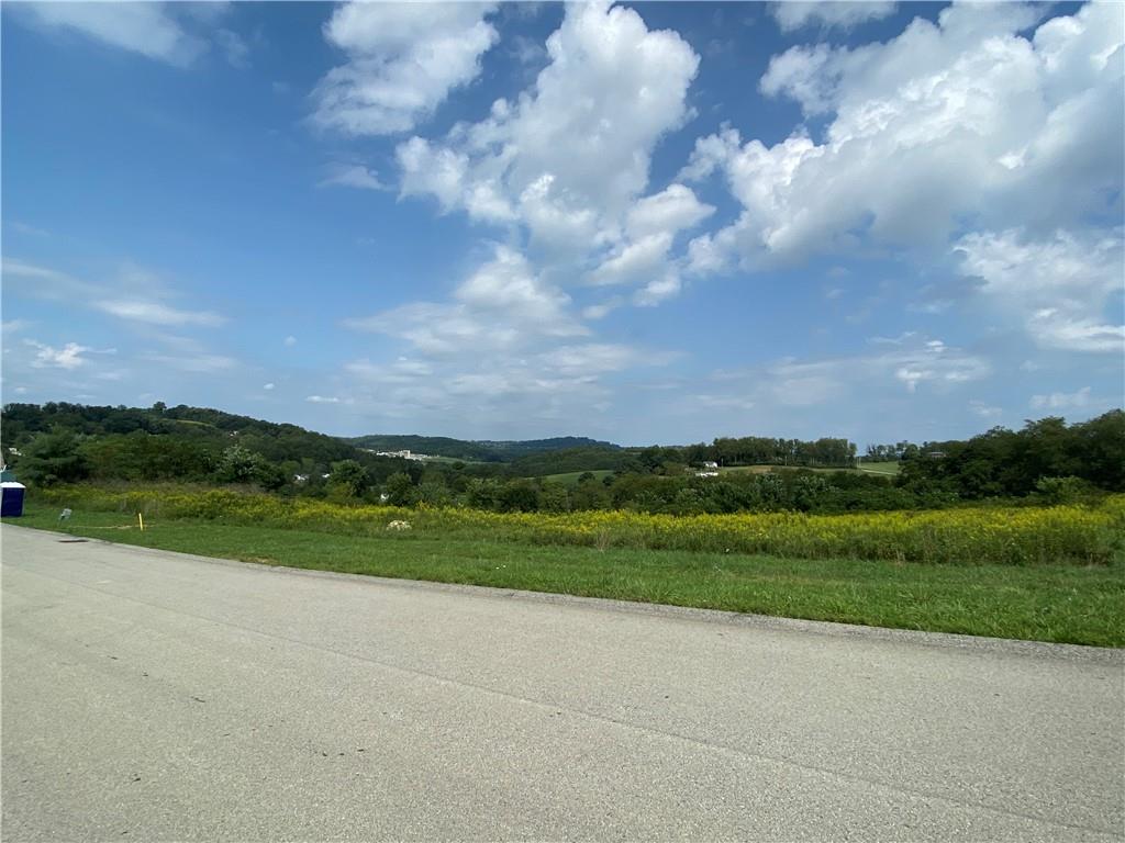 150 Sharon Drive Pleasant Unity, PA 15676 - Photo 8 of 16 a view of a green field with an ocean