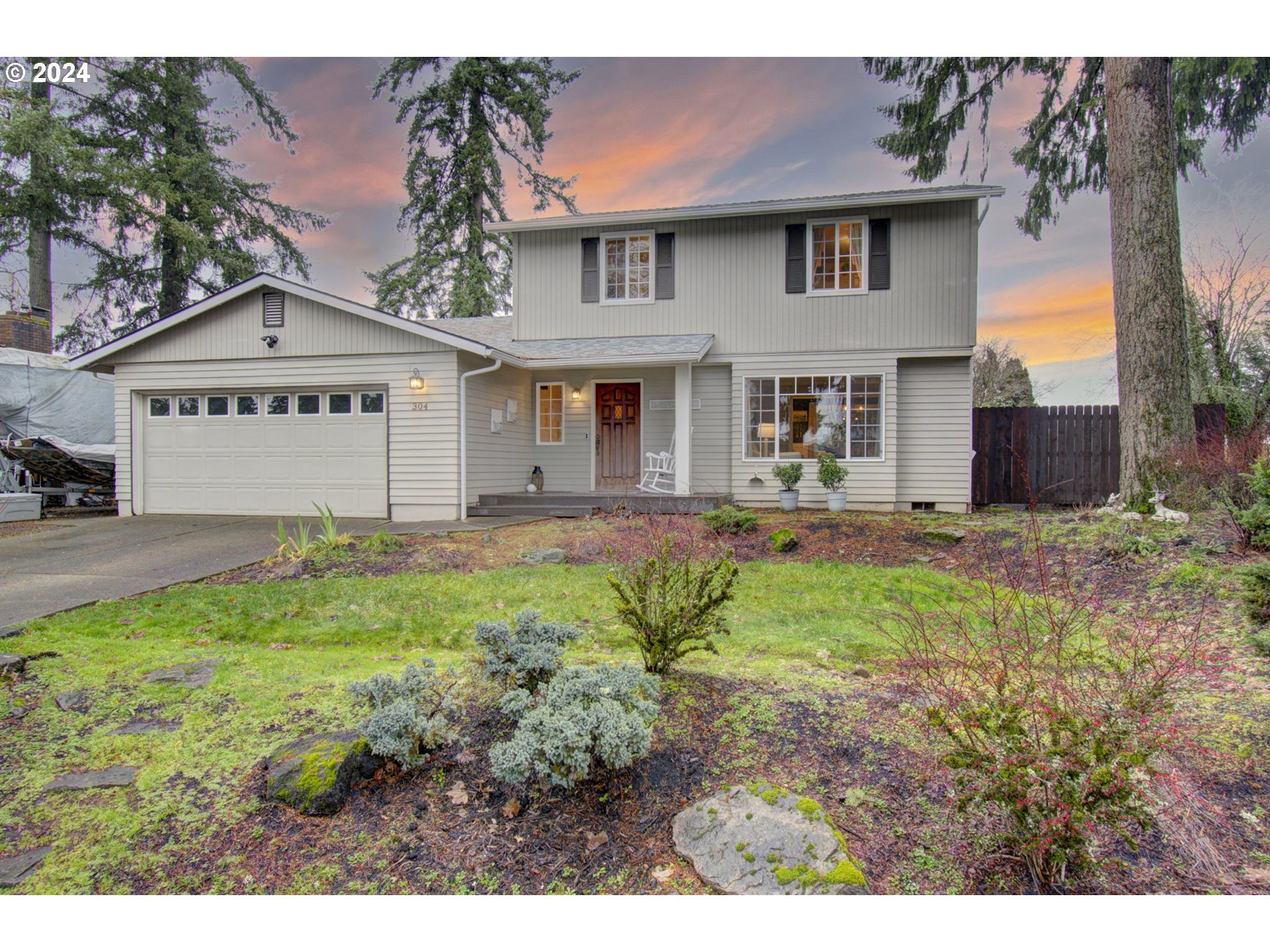 304 Northwest 8th Street Battle Ground, WA 98604 - Photo 2 of 35 a front view of a house with garden