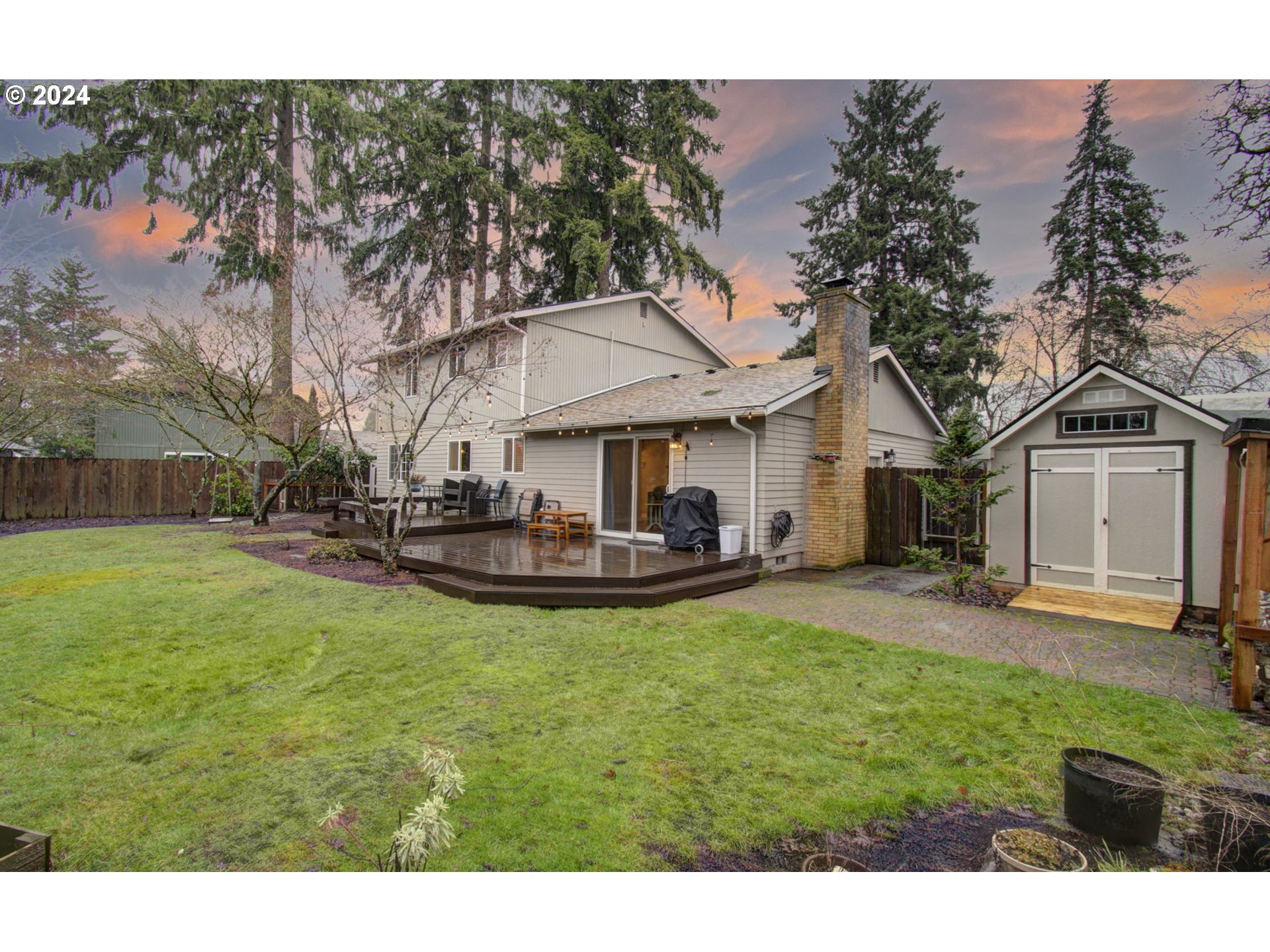 304 Northwest 8th Street Battle Ground, WA 98604 - Photo 31 of 35 a view of a house with swimming pool and sitting area