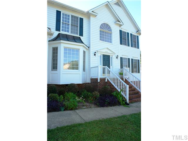 11612 Shavenrock Place Raleigh, NC 27613 - Photo 2 of 25 a view of a house with a yard