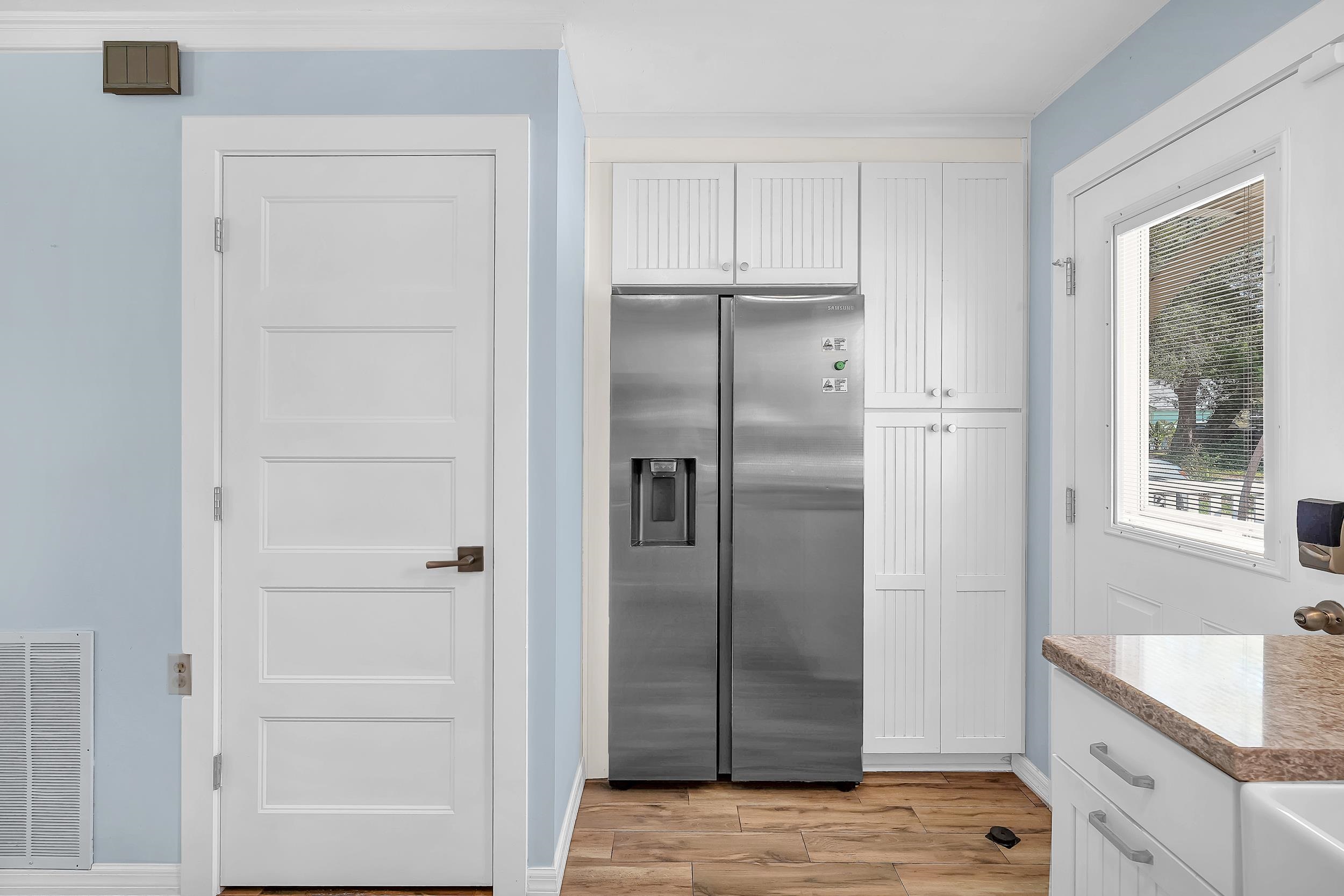 401 E Street St. Augustine, FL 32080 - Photo 11 of 36 a kitchen with a refrigerator and window