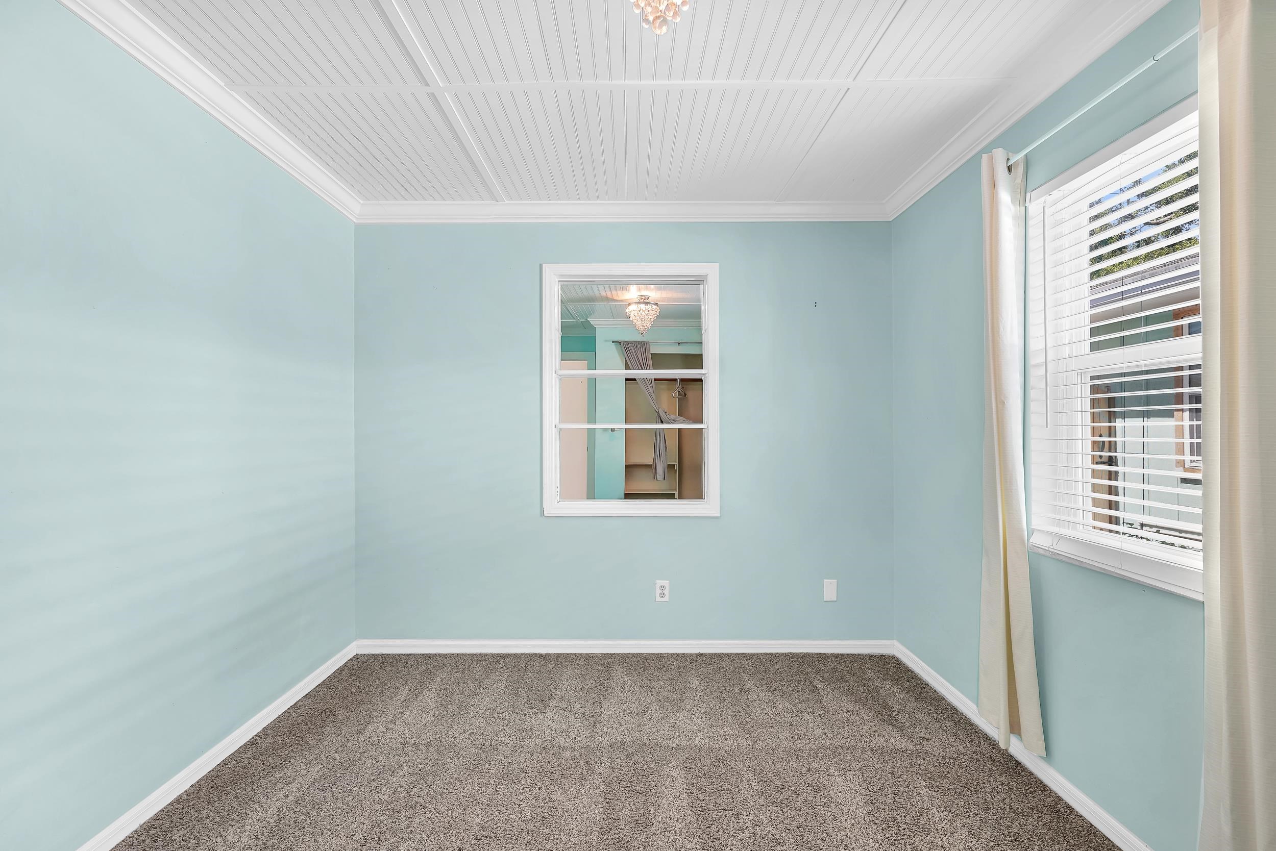 401 E Street St. Augustine, FL 32080 - Photo 15 of 36 a view of an empty room with a window