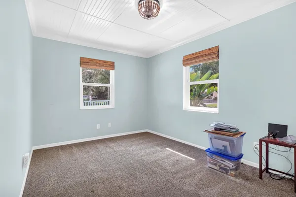 a view of room with air conditioner and window