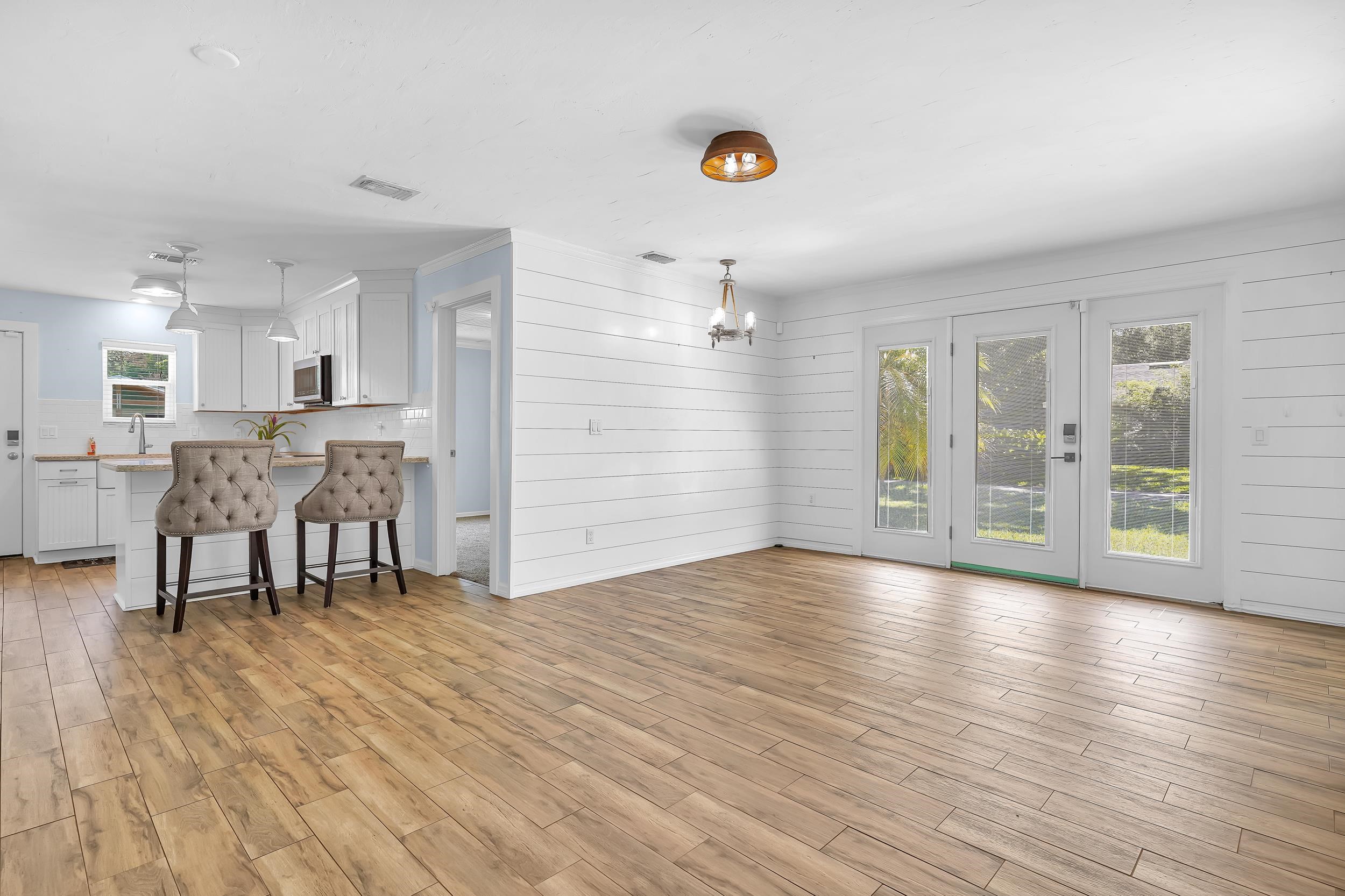 401 E Street St. Augustine, FL 32080 - Photo 22 of 36 a view of a livingroom with furniture wooden floor and windows