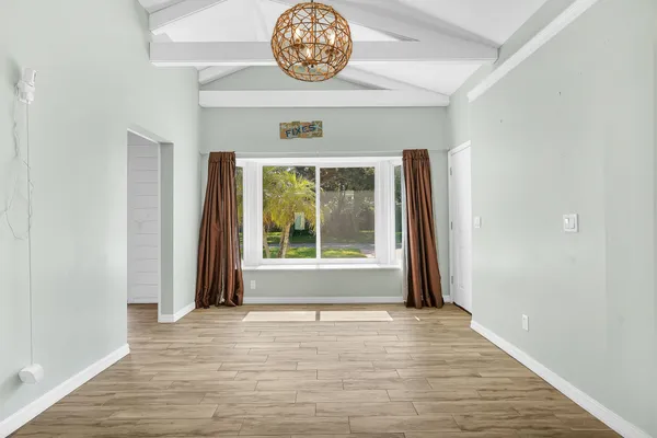 a view of an empty room and window