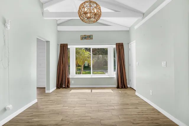 a view of an empty room and window