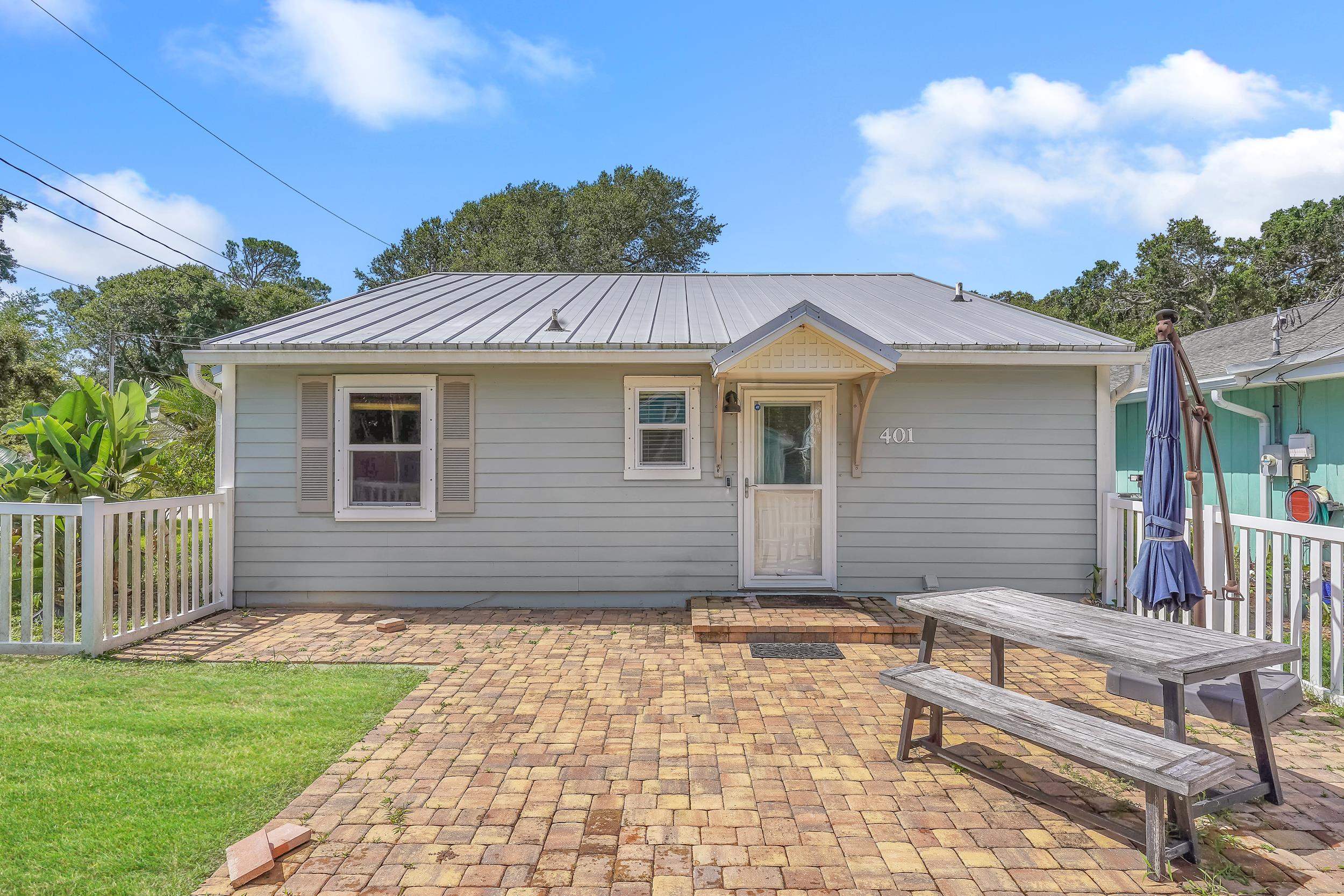 401 E Street St. Augustine, FL 32080 - Photo 33 of 36 a front view of a house with garden