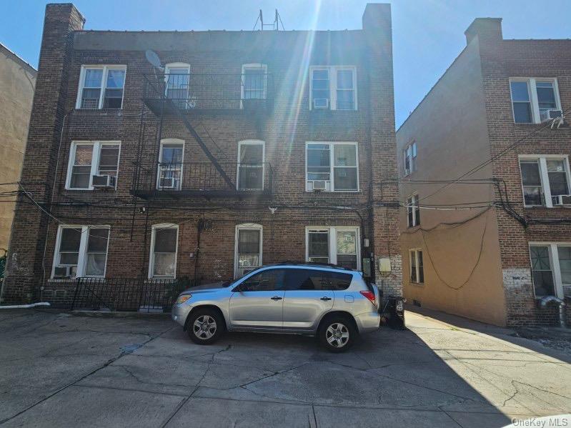 43-32 40th Street Queens, NY 11104 - Photo 14 of 14 a car parked in front of a building