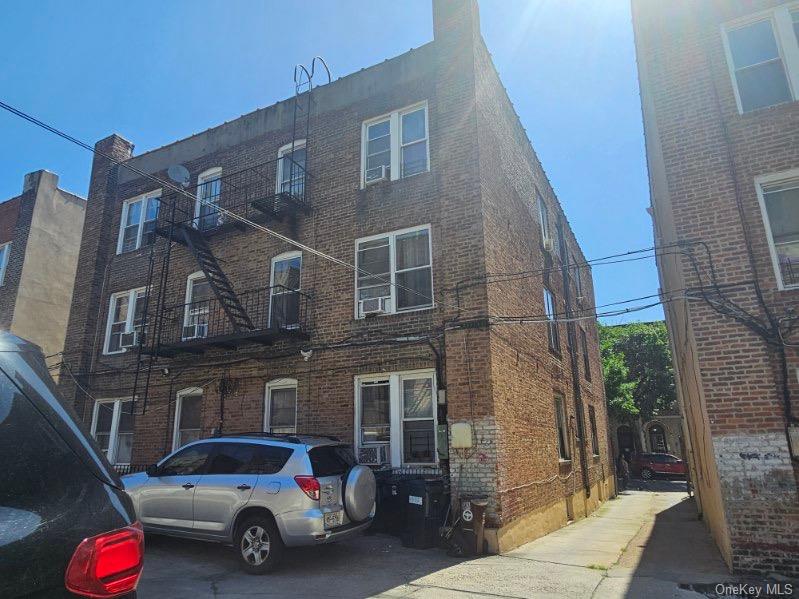 43-32 40th Street Queens, NY 11104 - Photo 4 of 14 a car parked in front of a building