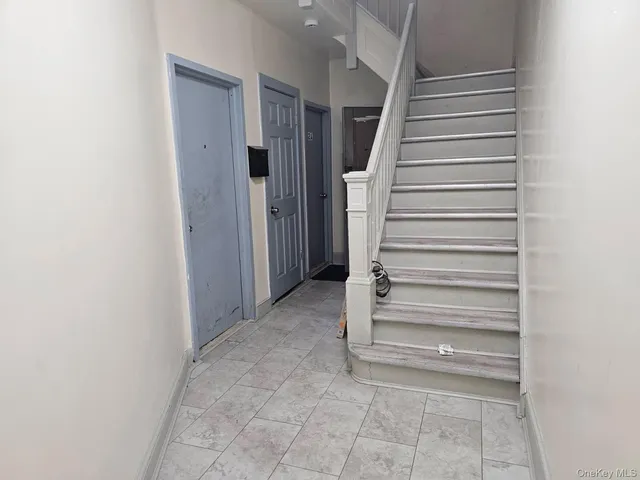 a bathroom with a sink mirror toilet and vanity
