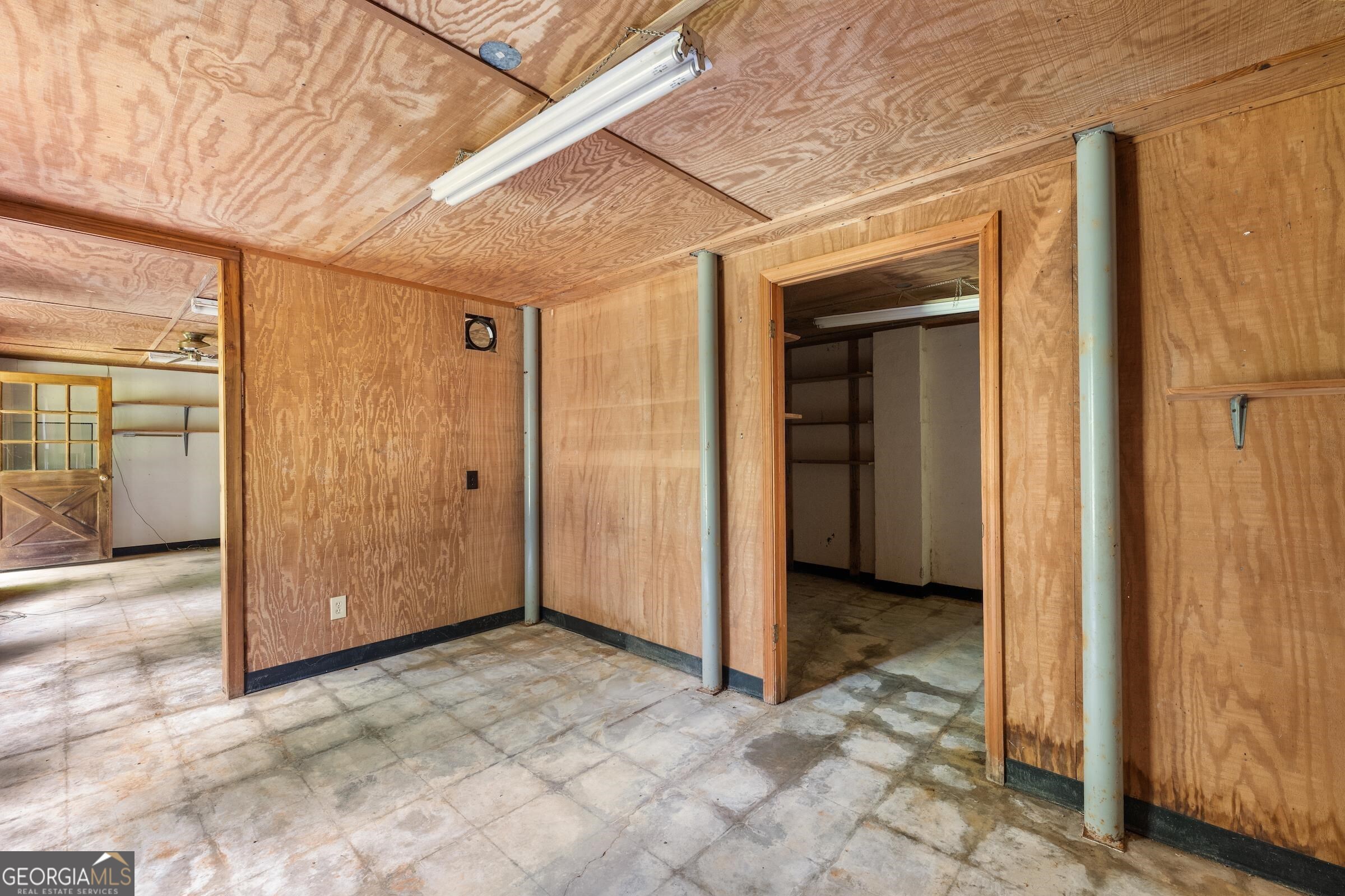 966 Wahoo Creek Road Murrayville, GA 30564 - Photo 53 of 81 a view of a hallway with wooden shelves